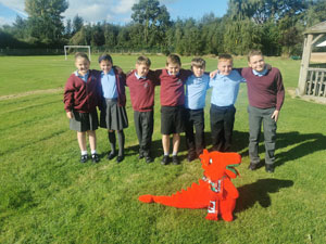 School pupils with Welsh dragon