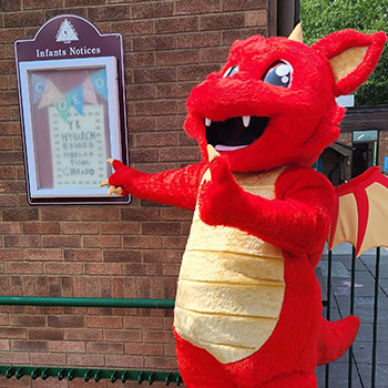 School pupils with Welsh dragon